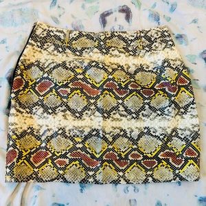 NWOT PRETTYLITTLETHING Snakeskin mini skirt with belt holes detail